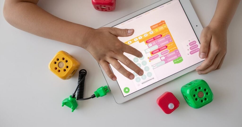 Child using an educational app on a tablet for learning