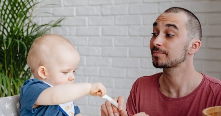 Baby high chair and feeding photo for When to Start Solids: What the Research Says